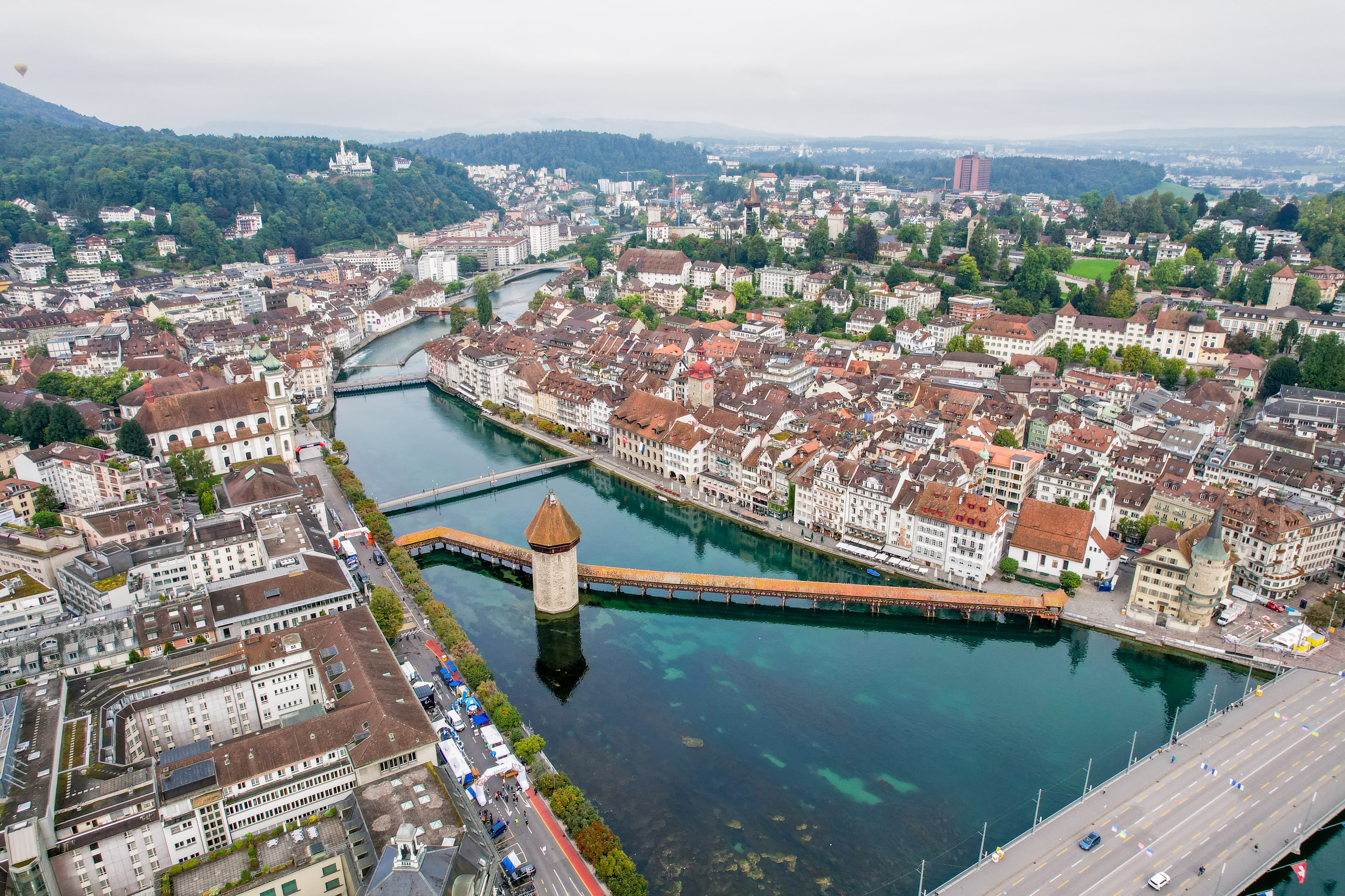 Lucerne, a picturesque alpine city in Switzerland, captivates visitors with its timeless charm. Known for landmarks like the Chapel Bridge and Lake Lucerne Promenade, this enchanting destination offers a serene escape blending tradition and modernity. As a travel photographer with over 70,000 images, Kyle Kroeger specializes in capturing moments that transcend mere scenery, diving into the heart of visual storytelling. --